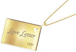 Win a Yellow Gold and Diamond Love Letter Necklace (Worth $599) from Womans Day