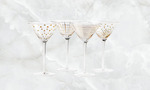 Win 1 of 2 Sets of Four Hand-Foiled Gala Martini Glasses from Toast Magazine